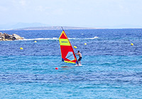 Surfer am Playa de Es Pujols